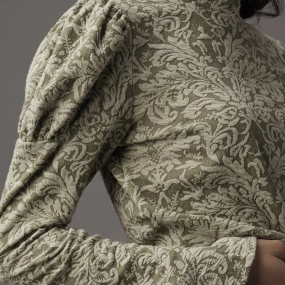 Anthropologie Top Olive Grn Cream Jacquard Puff Slvs Flare Wrist Mock neck tie